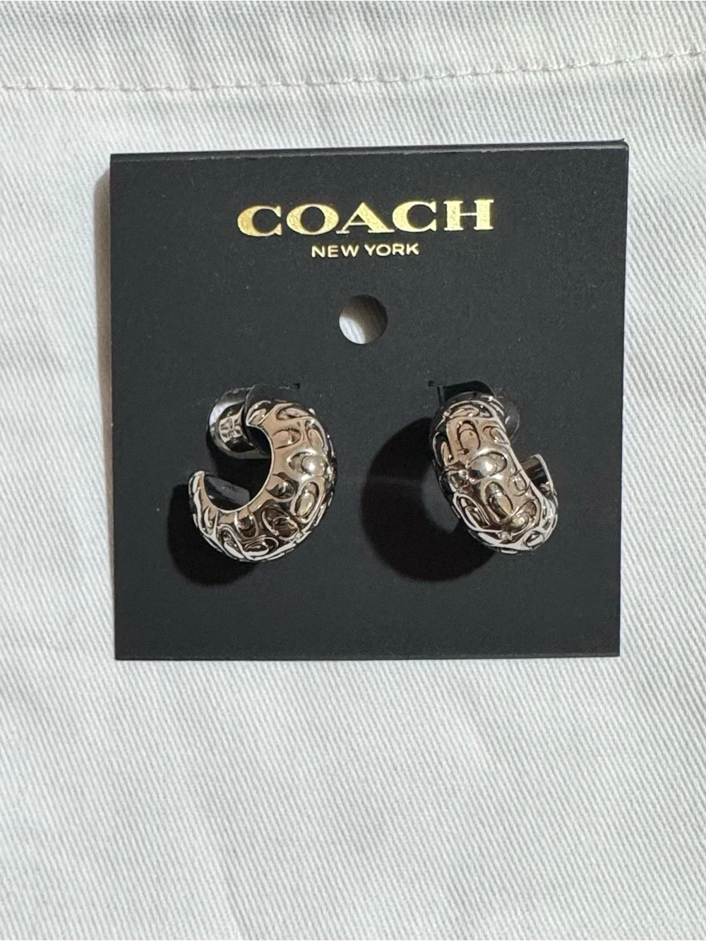 COACH Silver-Tone Signature Pattern Hoop Earrings - Picture 1 of 4